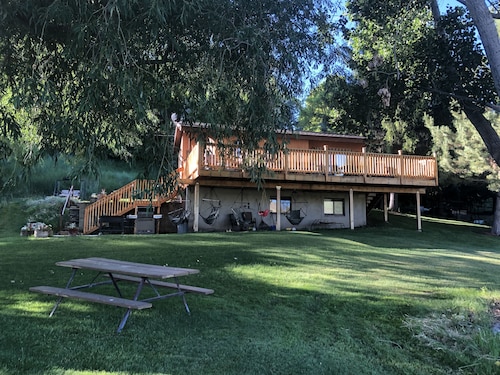 A wonderful, secluded 2 story cabin, deck, fire pit, stocked pond for fishing.  