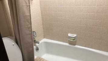 Combined shower/tub, hair dryer, towels, soap