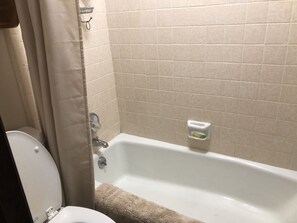 Combined shower/bathtub, hair dryer, towels, soap