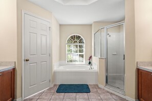 Combined shower/tub, hair dryer, towels, soap