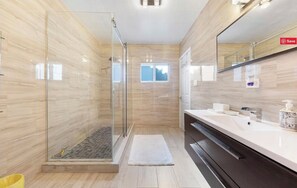 Bathtub, hair dryer, towels