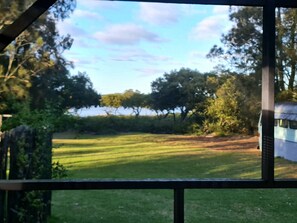 Property grounds - SO Relaxing! Huge screened deck with Bay view, pet friendly, walk to beach ⛱️ 
 (Culburra Beach)