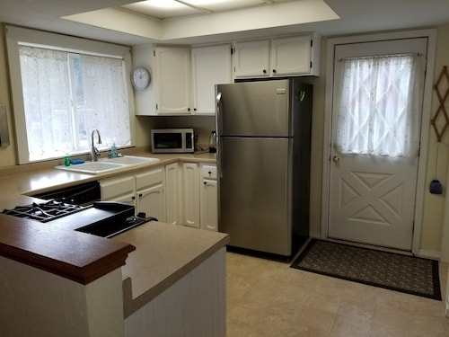 Coeur d'Alene's Famous Lakeshore Cottage next to Sander's Beach and Tubb's Hill!