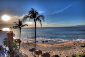 On the beach, sun loungers, beach towels