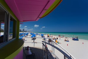 On the beach, sun-loungers, beach towels