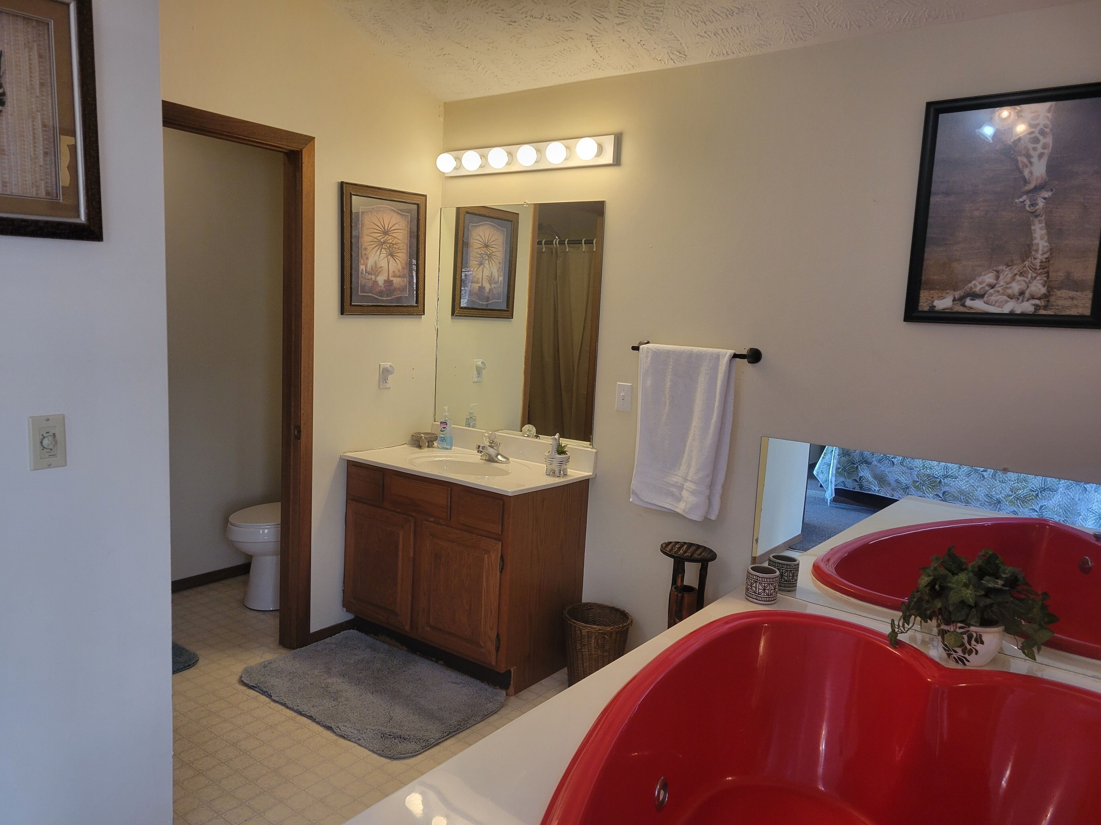 Shower, jetted tub, towels, soap