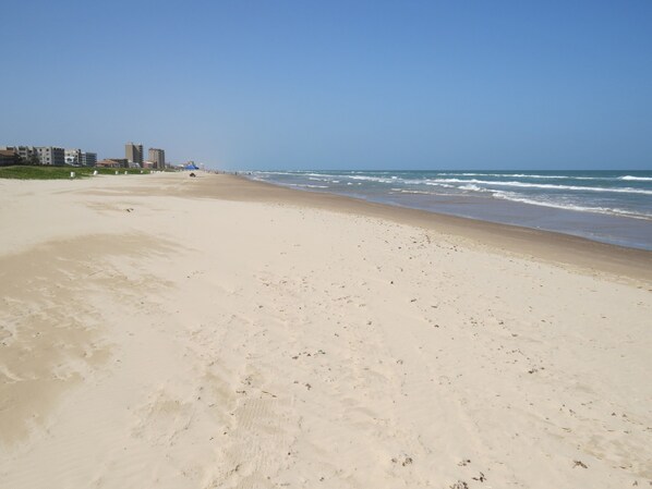 On the beach, sun loungers, beach umbrellas, beach towels