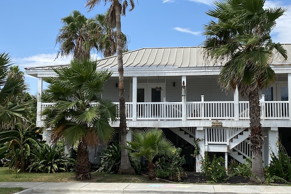 Key West style house has two private upstairs vacation units.
