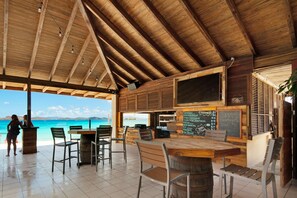 Outdoor dining - Luxurious, Penthouse, 2 level, corner unit Oceanfront condo at Sapphire Beach (St Thomas)