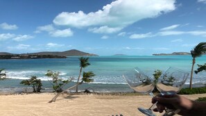 On the beach, sun-loungers, beach towels