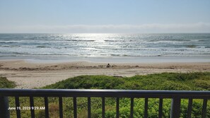 On the beach, sun loungers, beach towels