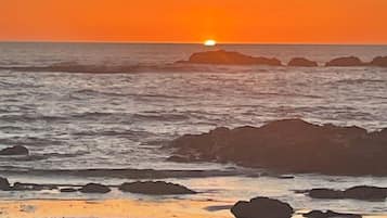 On the beach, sun loungers, beach towels