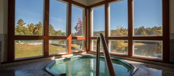  Resort home with Private hot tub , fireplace, pools, pond, WIFI 