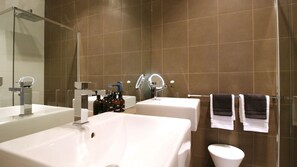 Shower, hair dryer, bathrobes, towels