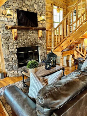 Smart TV, fireplace, books