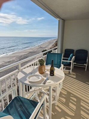 Outdoor dining - 508 Indian Harbour Bch Club Oceanfront. End Unit. Panoramic View Like Paradise! (Indian Harbour Beach)