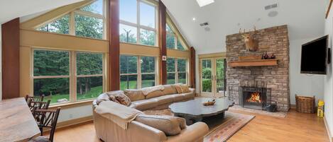 Flat-screen TV, fireplace, video games, DVD player