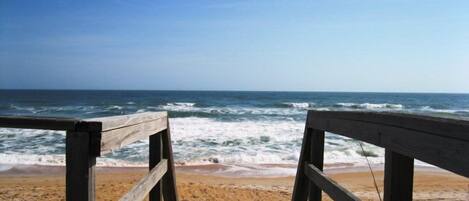 On the beach, sun loungers, beach towels