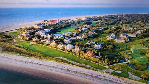 An aerial view of a coastal resort with beachfront properties, a golf course, and a large hotel complex. - Marina view Condo in Wild Dunes Resort, Isle of Palms, SC (Isle of Palms)