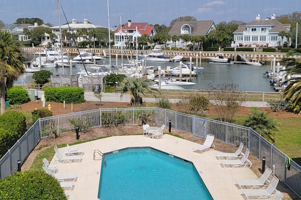 View from Condo. Yachts and Sailboats at Isle of Palms Marina.
