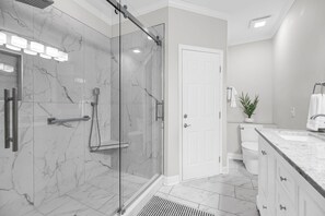 Combined shower/tub, hair dryer, towels, toilet paper