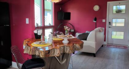 Modern country cottage that is dog friendly with a fenced-in yard.