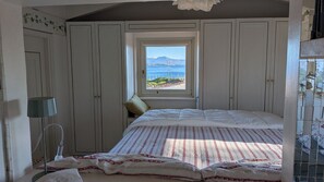 1 chambre, fer et planche à repasser, draps fournis