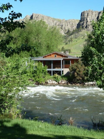 The Stillwater River, The River Cabin and the rimrocks behind.