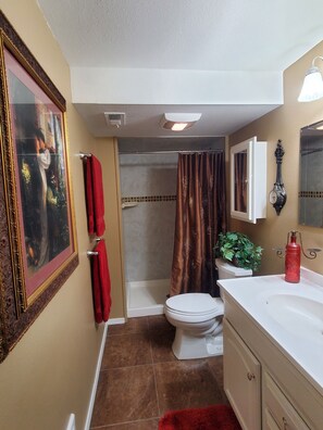 Shower, hair dryer, towels, soap