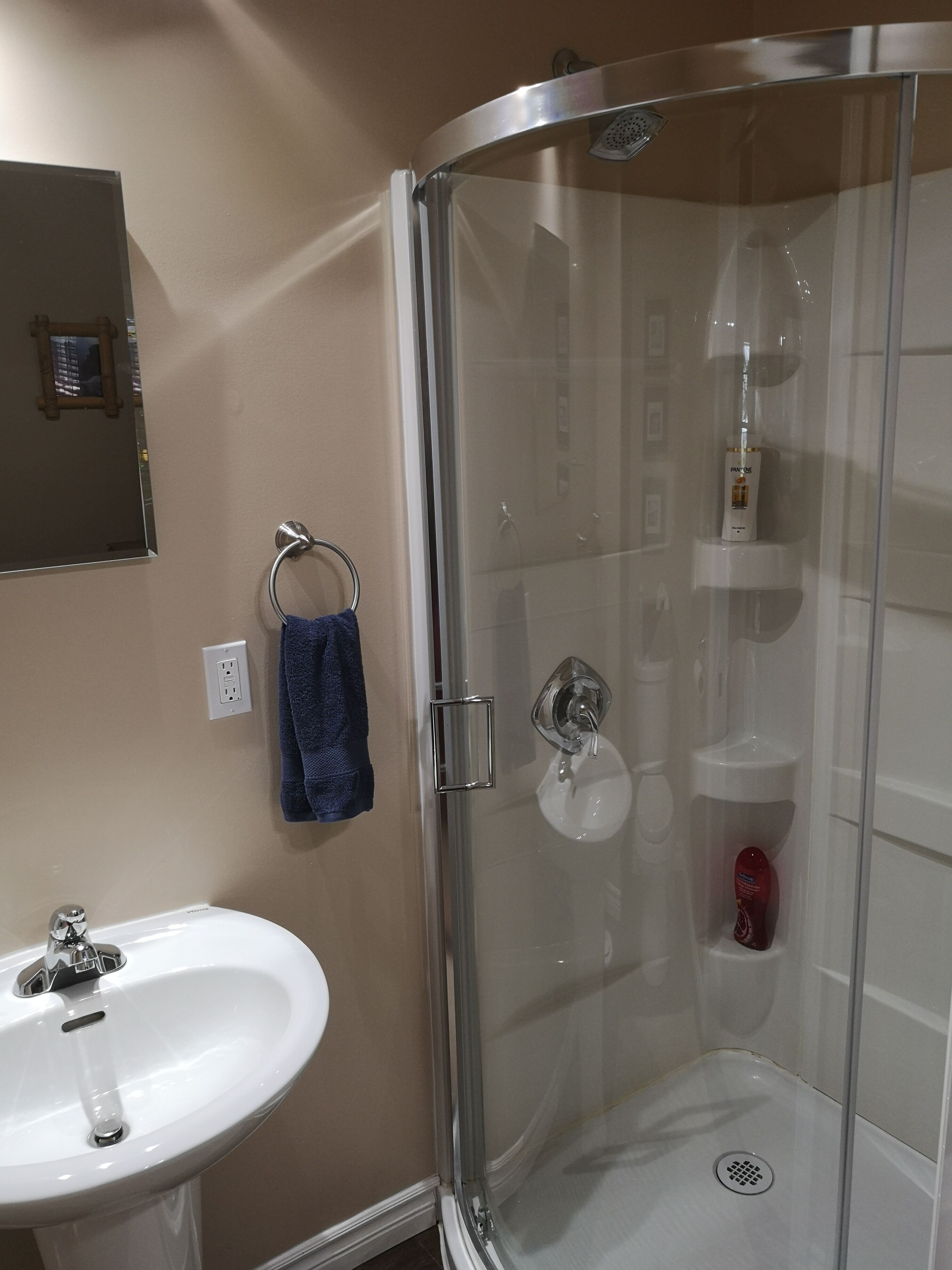Shower, towels, soap, shampoo