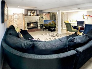 Smart TV, fireplace, DVD player, books