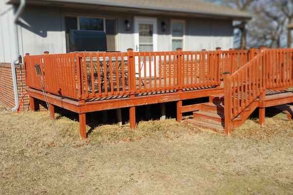 Spacious deck for morning coffin with mailbox for muffin delivery.