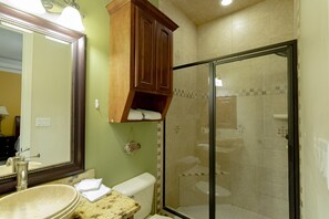Shower, towels, soap, toilet paper
