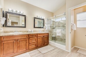 Combined shower/tub, hair dryer, towels, soap