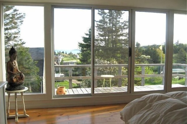 Deck off of queen bedroom; picture windows