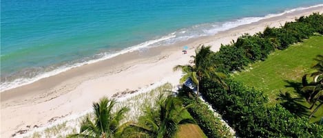 On the beach, sun-loungers, beach towels