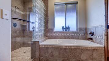Combined shower/tub, hair dryer, towels, soap