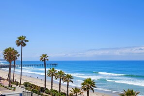 On the beach, sun-loungers, beach towels