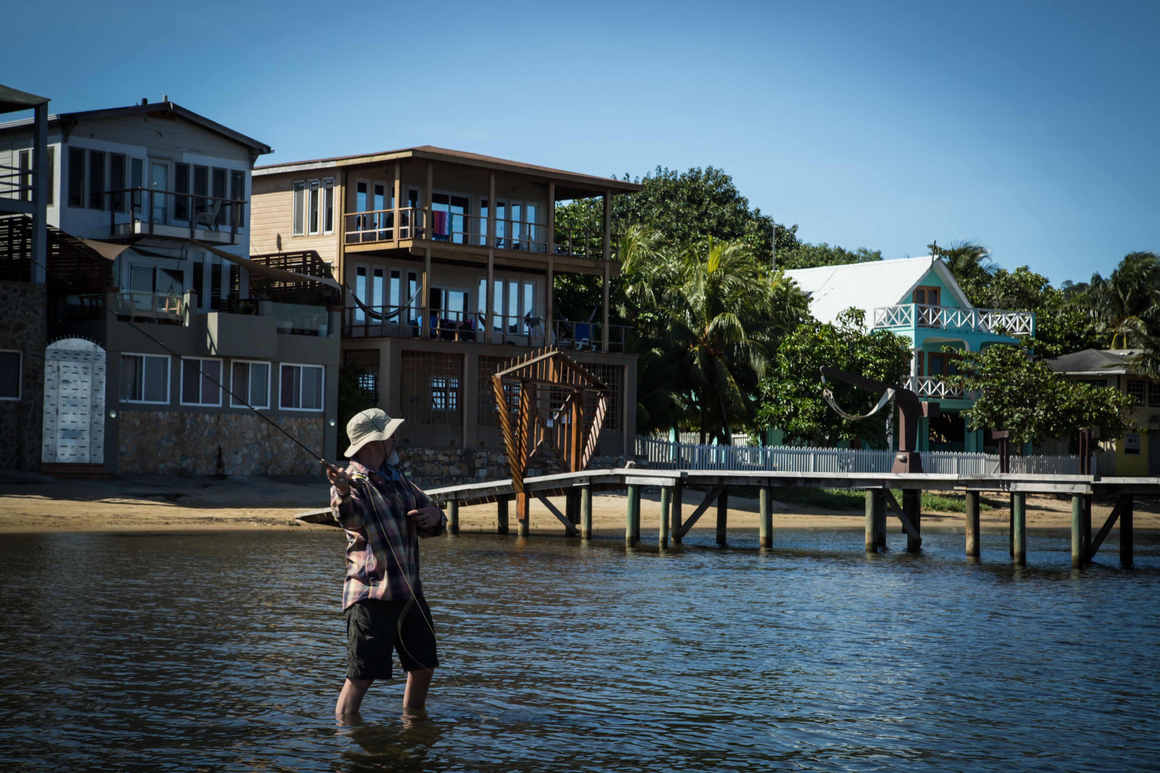 A waterfront property with a dock extending into the water.