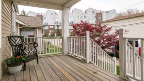 Enjoy the view from this deck overlooking the surrounding neighborhood.