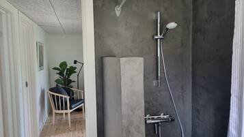 Shower, eco-friendly toiletries, hair dryer, towels