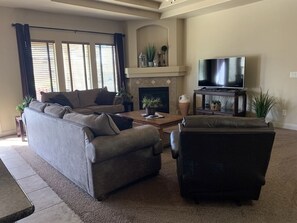 Smart TV, fireplace, DVD player, foosball