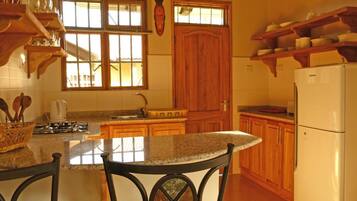 Fridge, microwave, toaster, cookware/dishes/utensils