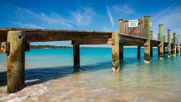On the beach, sun loungers, beach towels