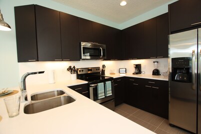 Outstanding, owner operated Townhome,  even a TV in the pool area!