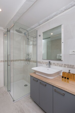 Hair dryer, towels, soap, toilet paper
