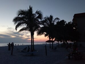 On the beach, sun-loungers, beach towels