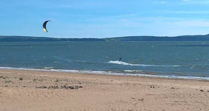 ĂlĂ©gant appartement cĂŽtier (rez-de-chaussĂ©e)