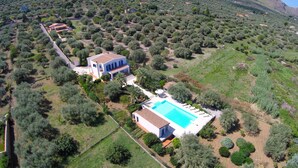 An aerial view of a property with a swimming pool, olive groves, and a house with a blue roof. - Blue House with pool. Paradise between sky and sea  (Trabia)