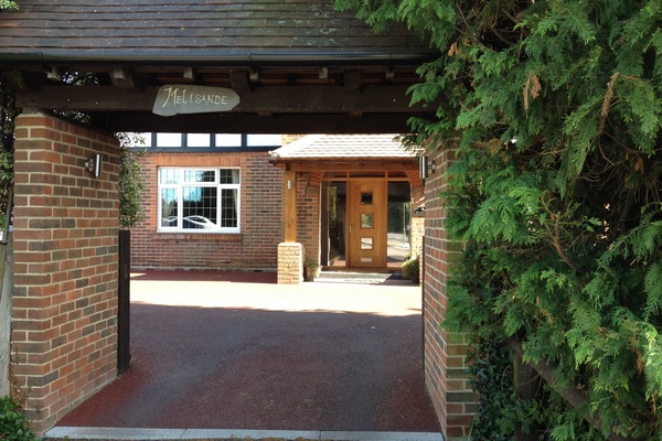 Apartment to the left down the sideway.